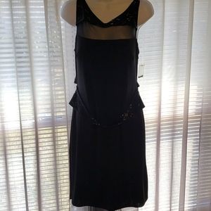 Black dress with mesh chest and back, sequined detail belt and back stripes